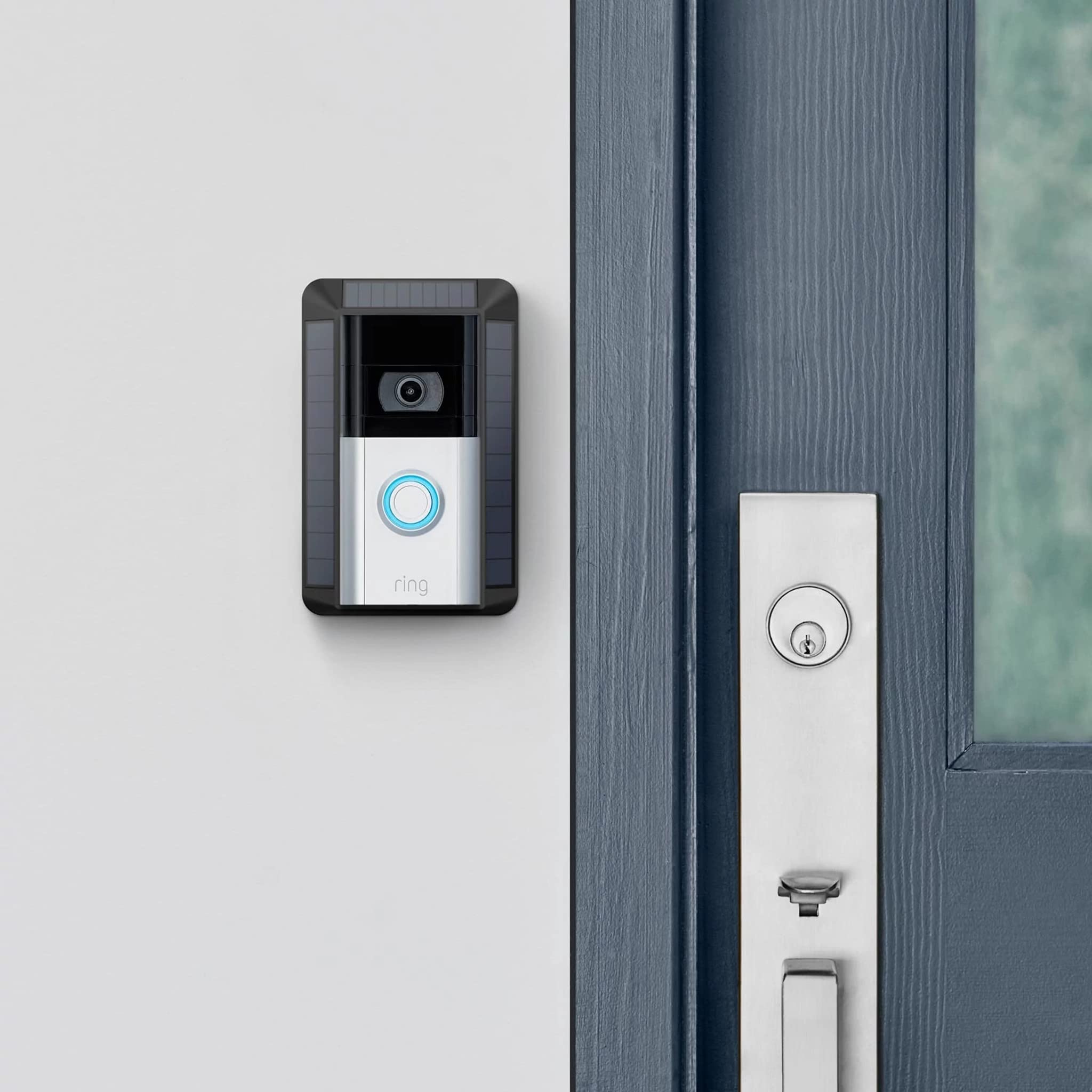Ring solar charger packaging and contents showing included bracket and installation hardware