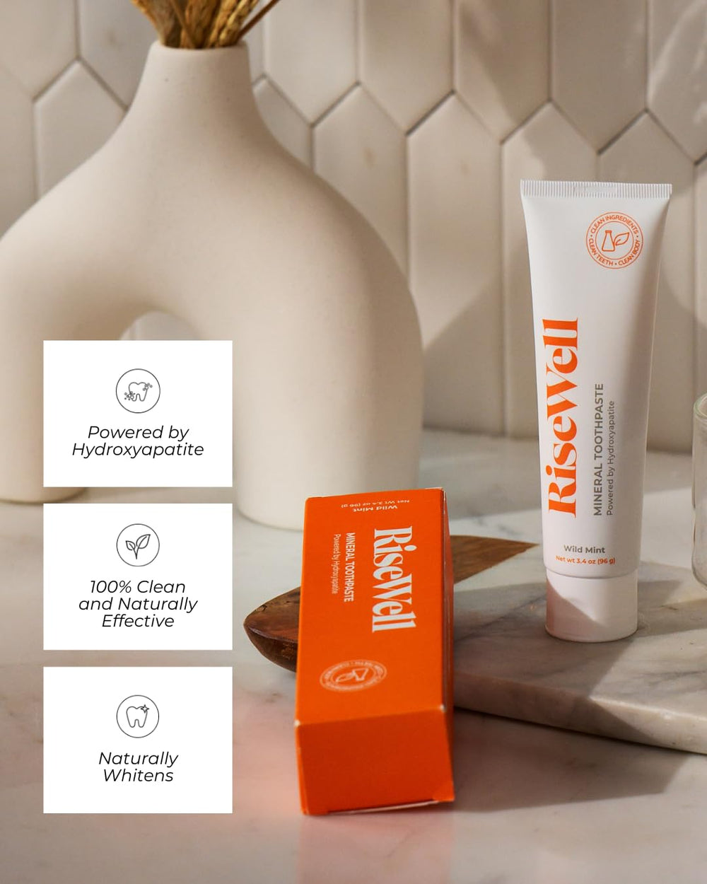 RiseWell wild mint tube and box overhead showing packaging and brand benefits