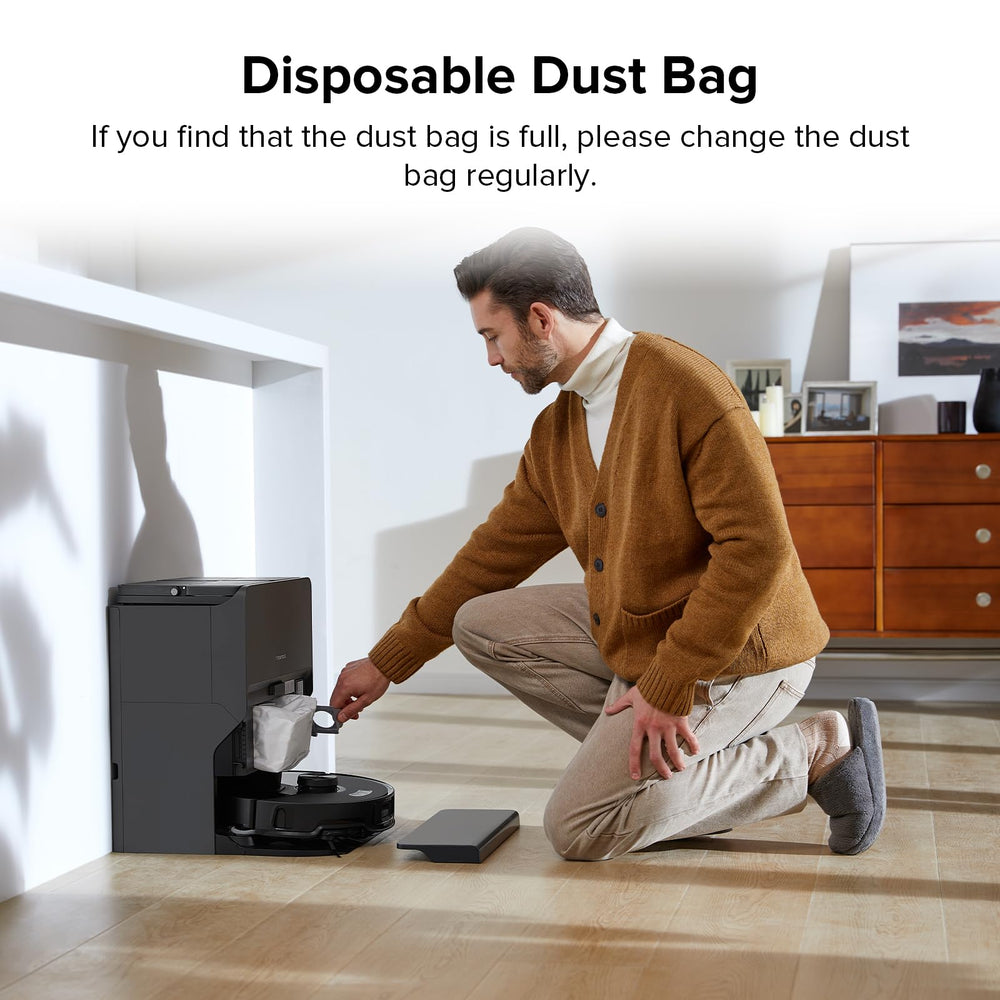 roborock bag next to hand for scale illustrating large capacity and fewer changes