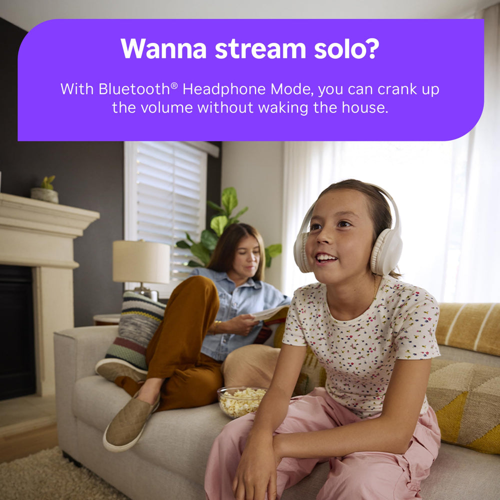 Roku Streaming Stick next to remote showing compact scale for clutter-free setups benefit