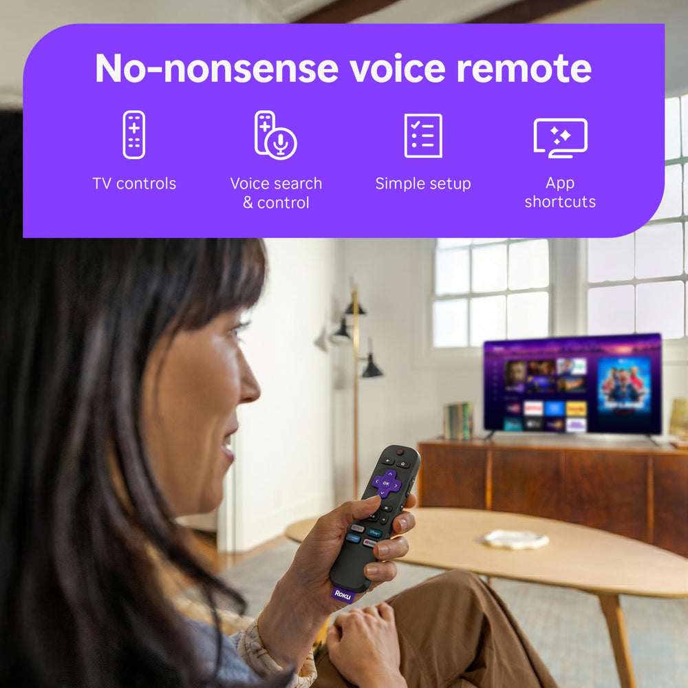 roku streaming stick held in hand showing compact size and portable travel convenience