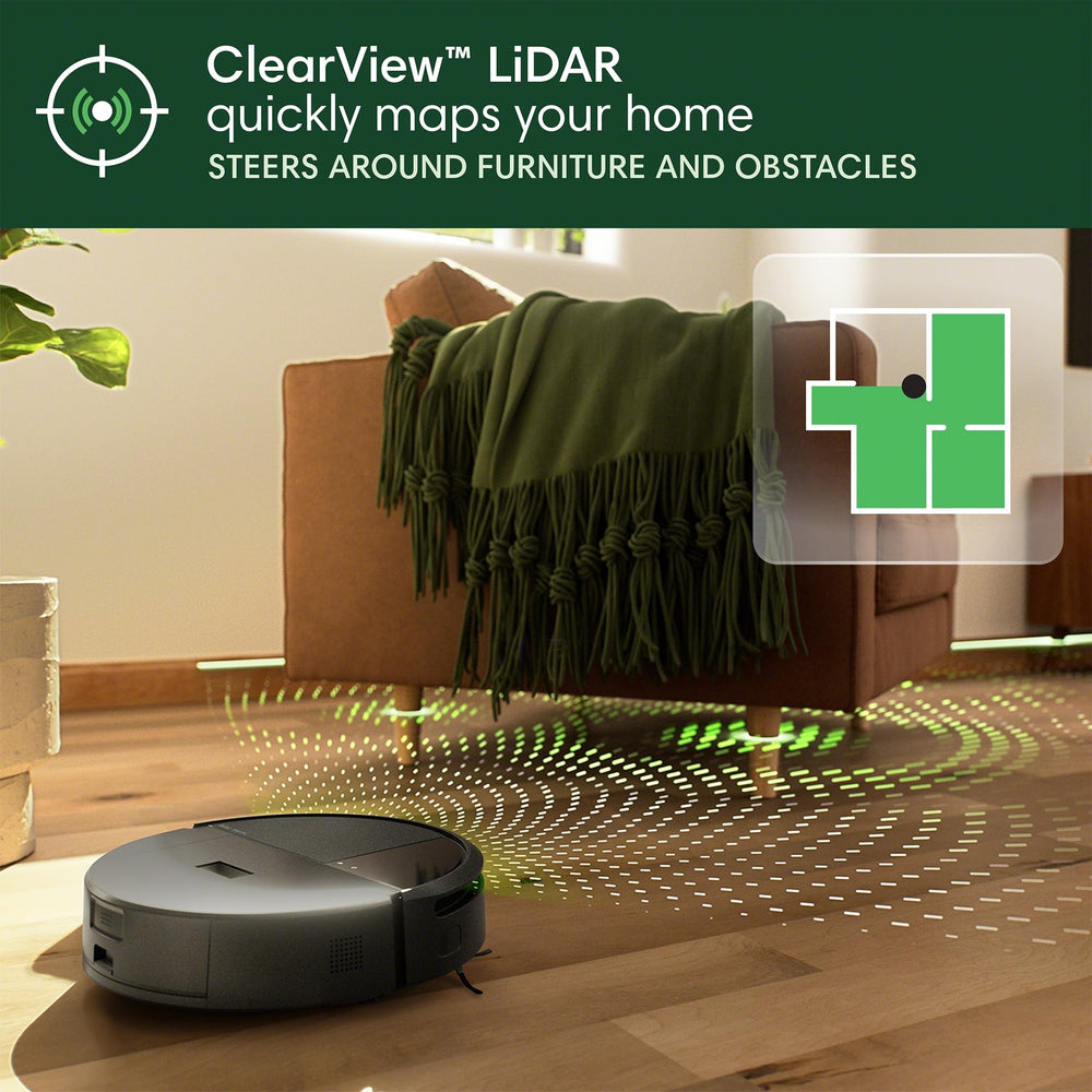 iRobot Roomba 205 open bin with compacted debris demonstrating reduced emptying frequency