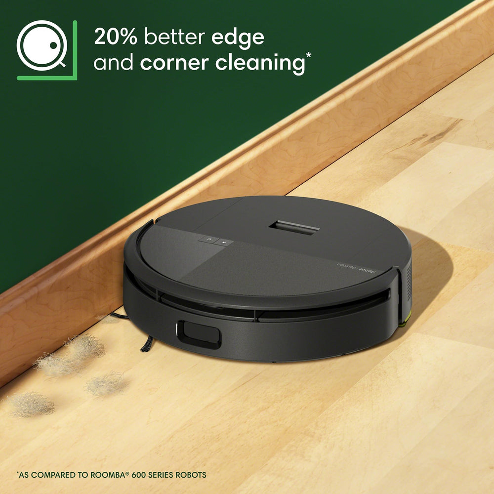 iRobot Roomba 205 beside sofa illustrating small footprint fits tight home spaces