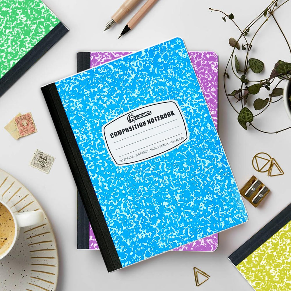 Rosmonde notebook on a desk with supplies showing study and work readiness