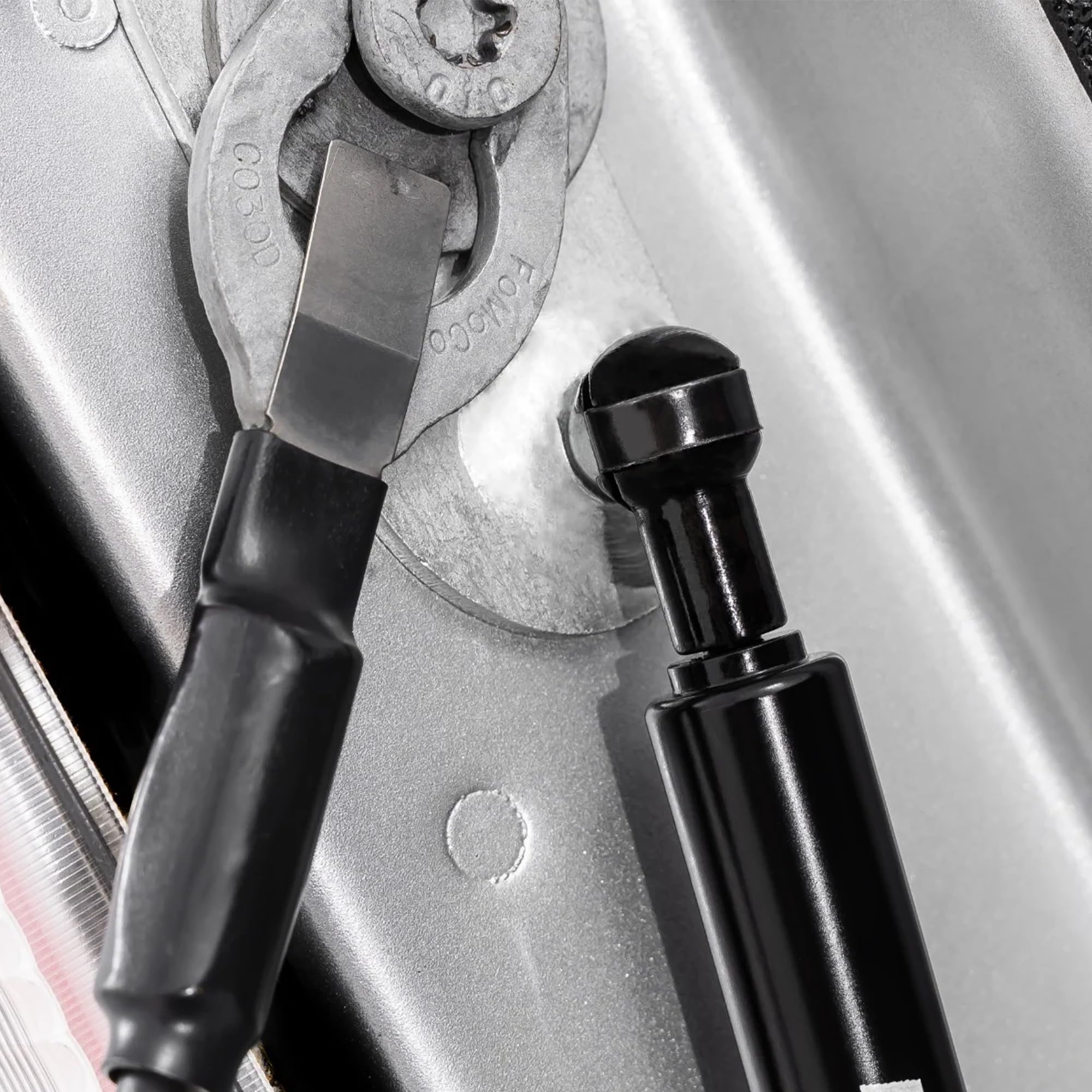 Rough Country installed on Ford F-150 driver side demonstrating controlled tailgate lowering