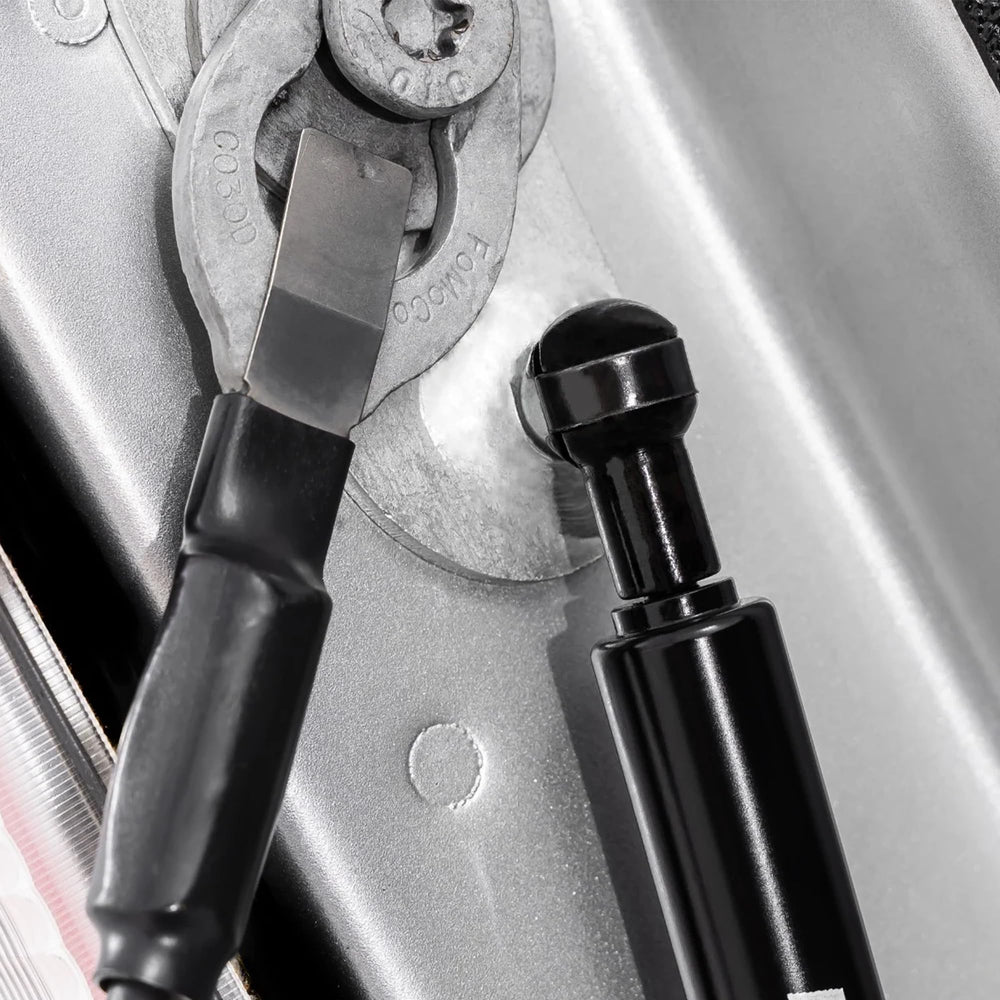 Rough Country installed on Ford F-150 driver side demonstrating controlled tailgate lowering