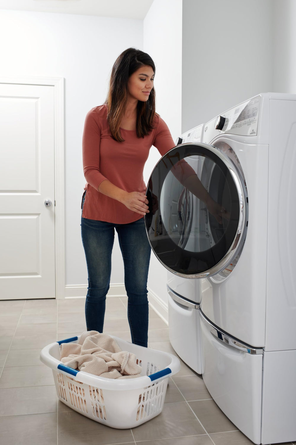 Rubbermaid next to a laundry detergent bottle showing compact footprint
