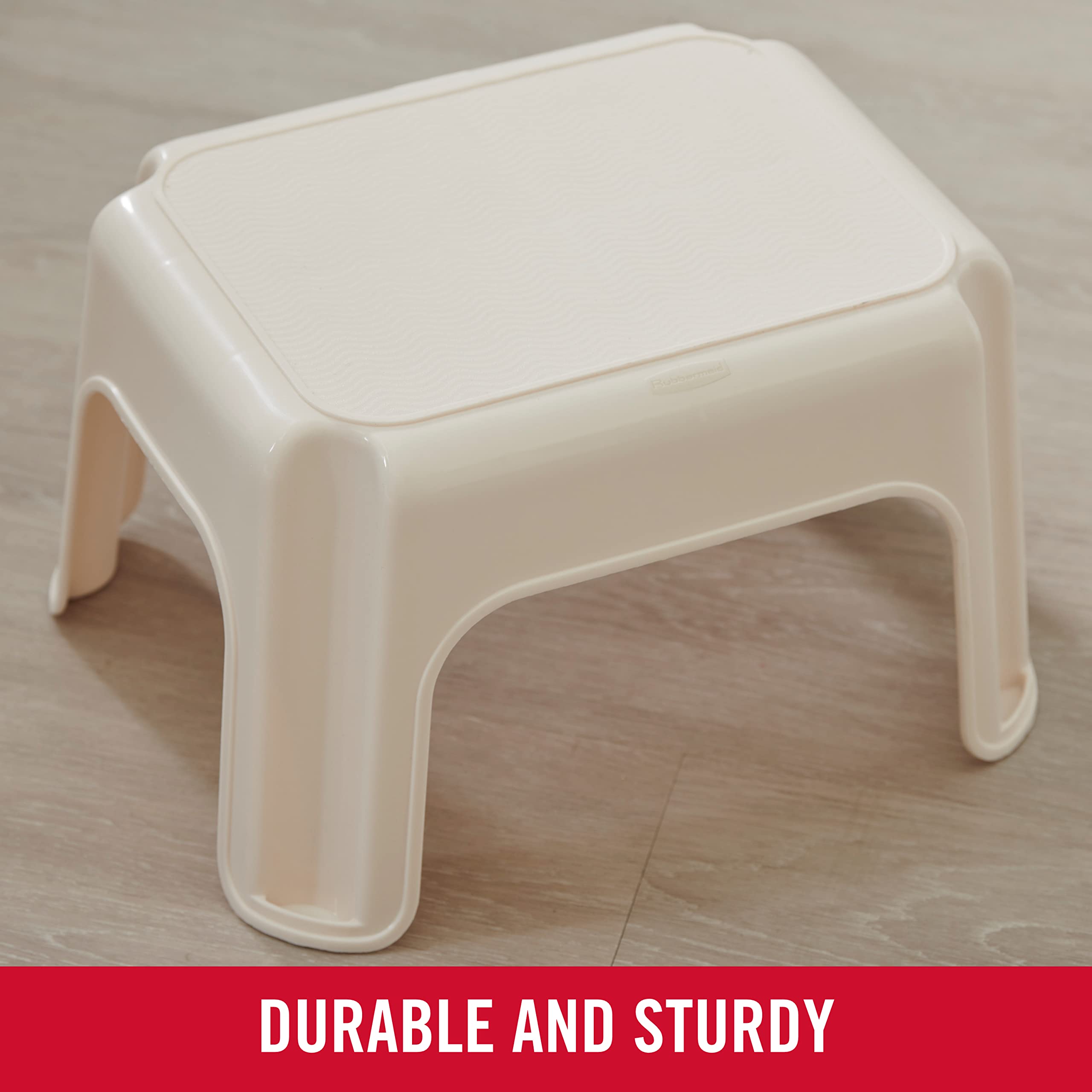 Rubbermaid Roughneck next to common chair for scale illustrating low-profile, space-saving size
