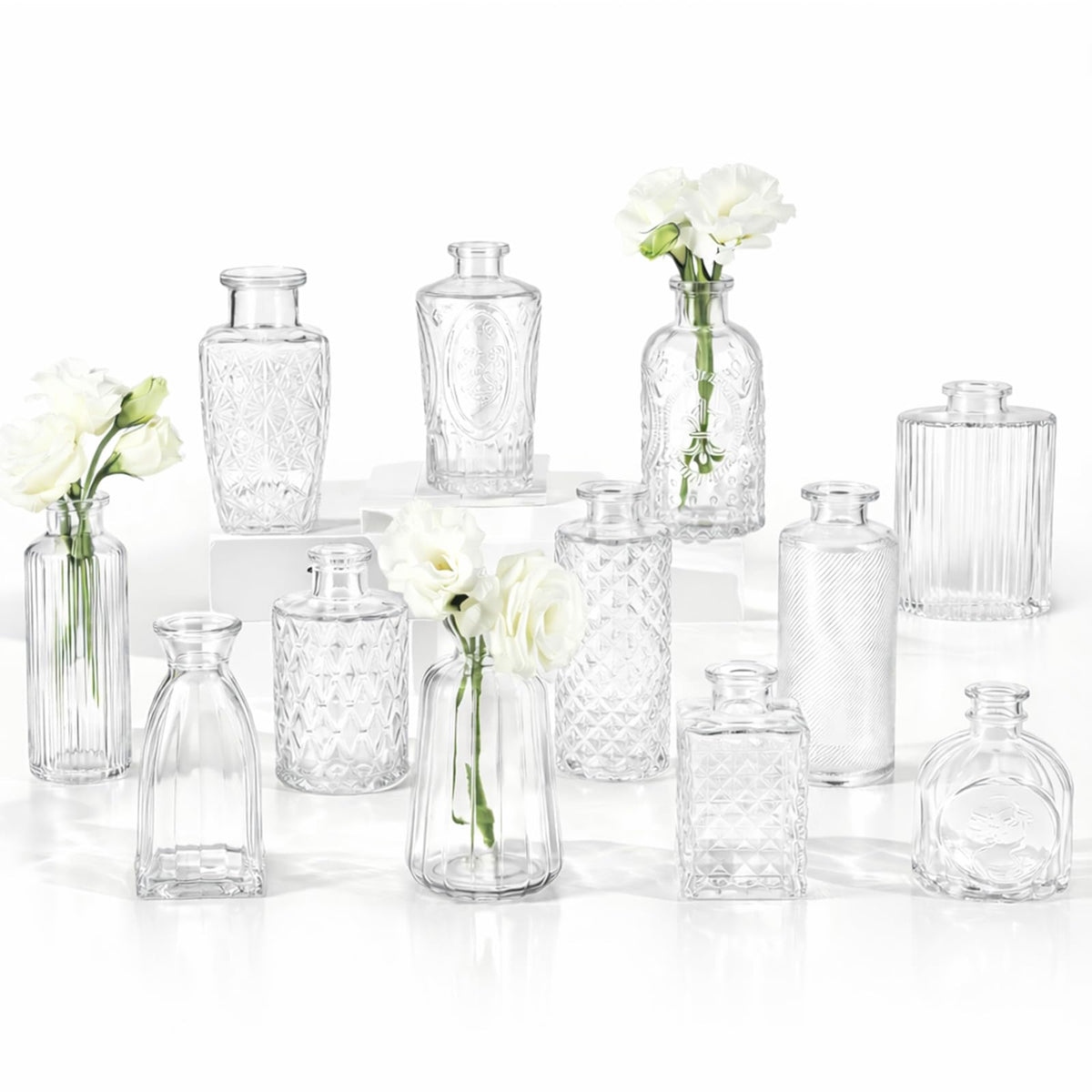 RUCKAE front view of 12 clear vases showing vintage style and easy table use