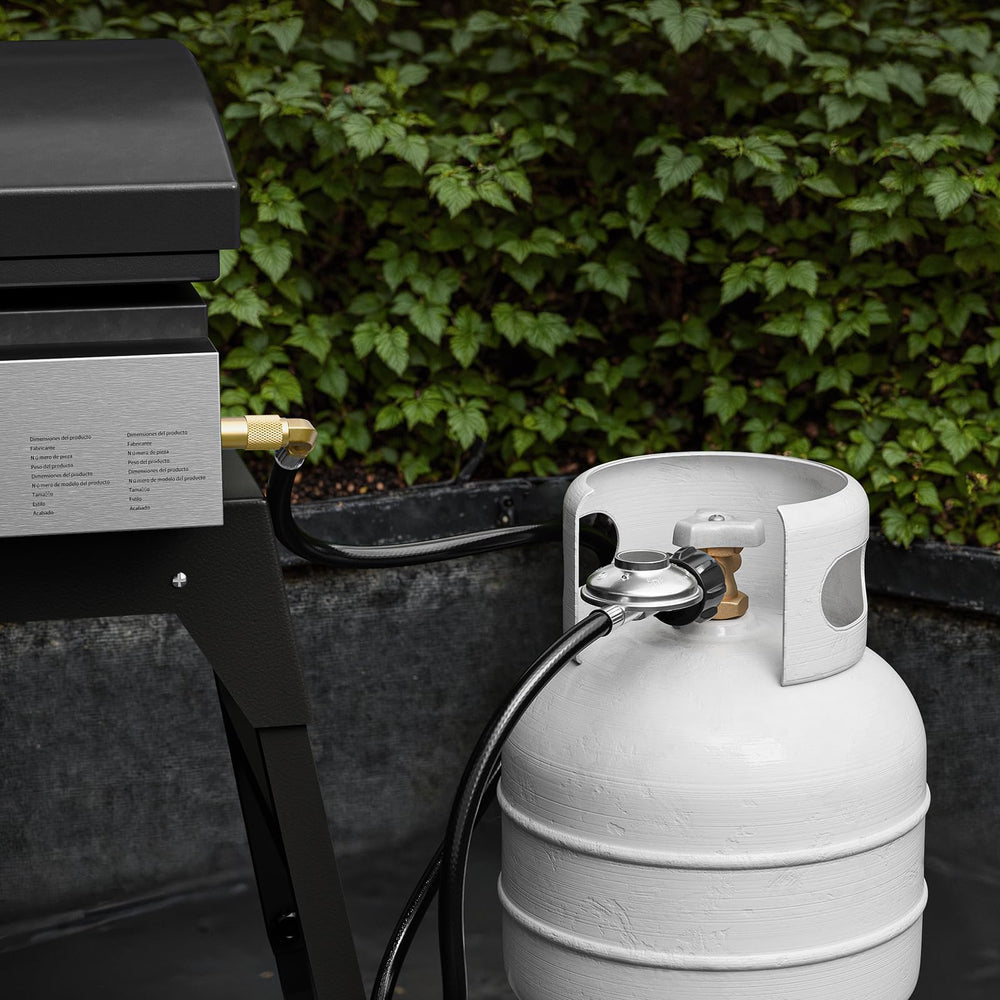 Rushare lifestyle shot on patio with Blackstone griddle showing convenient setup benefit