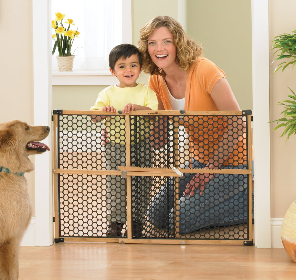 Safety 1st gate folded flat to store illustrating compact storage benefit