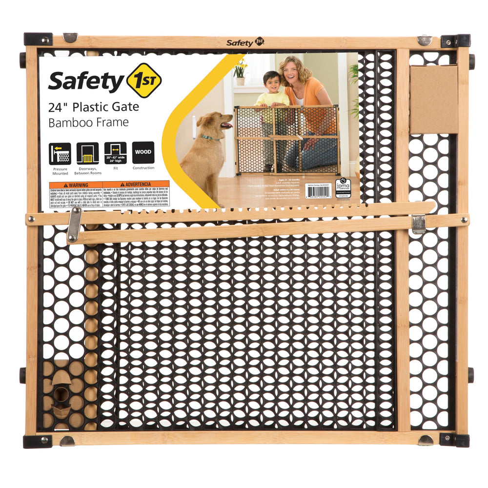 Safety 1st gate next to baby toy showing scale and child containment benefit