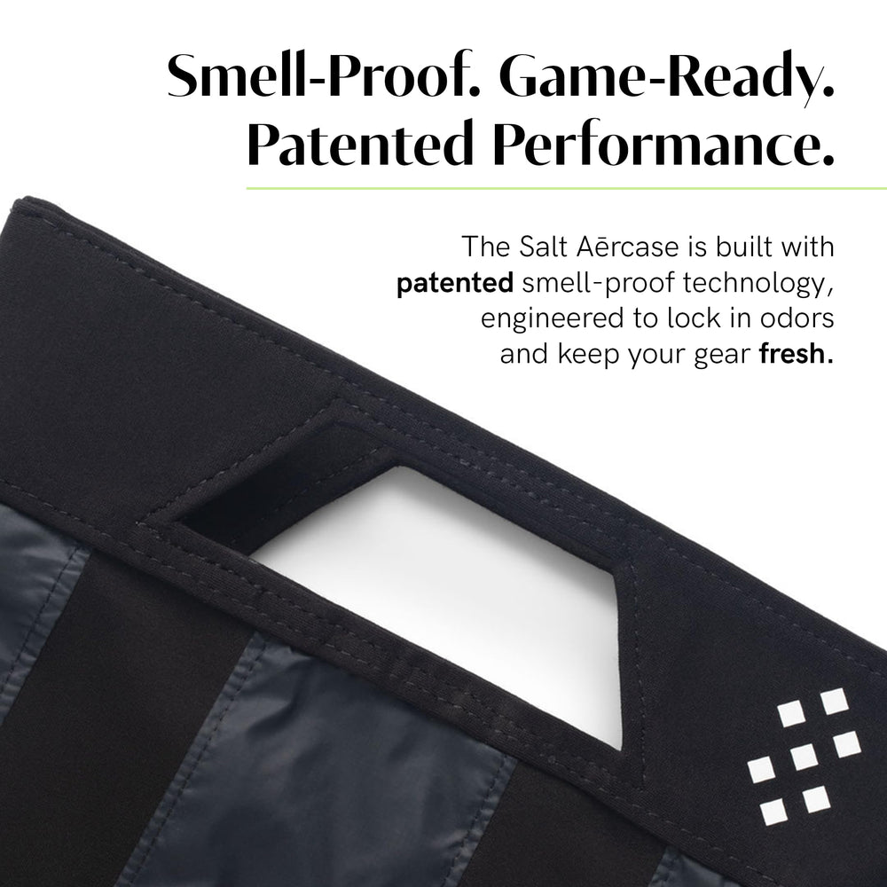 Salt Aērcase opened with cleats inside demonstrating organized storage benefit