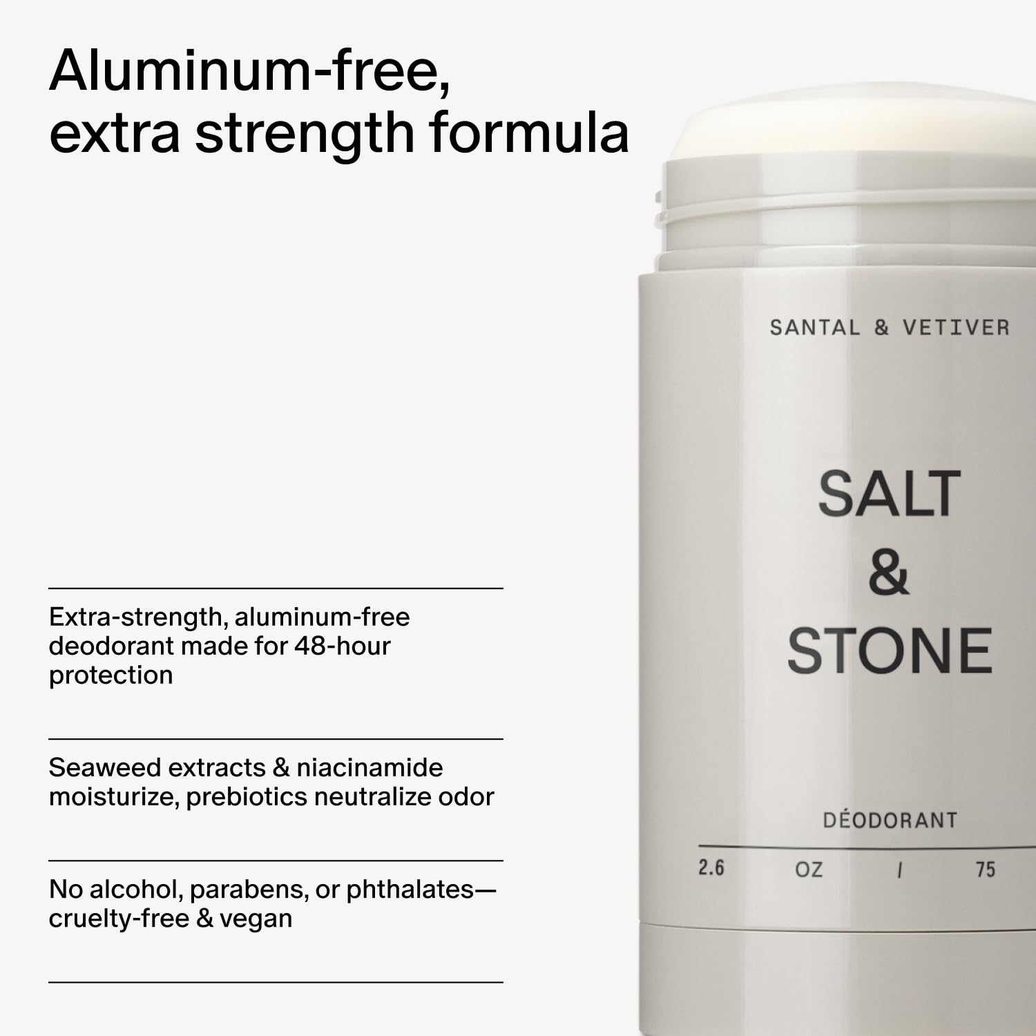 Salt & Stone deodorant held in hand for scale and easy travel-size comparison