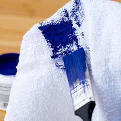 S&T INC. towel drying dishes in kitchen demonstrating streak-free drying benefit