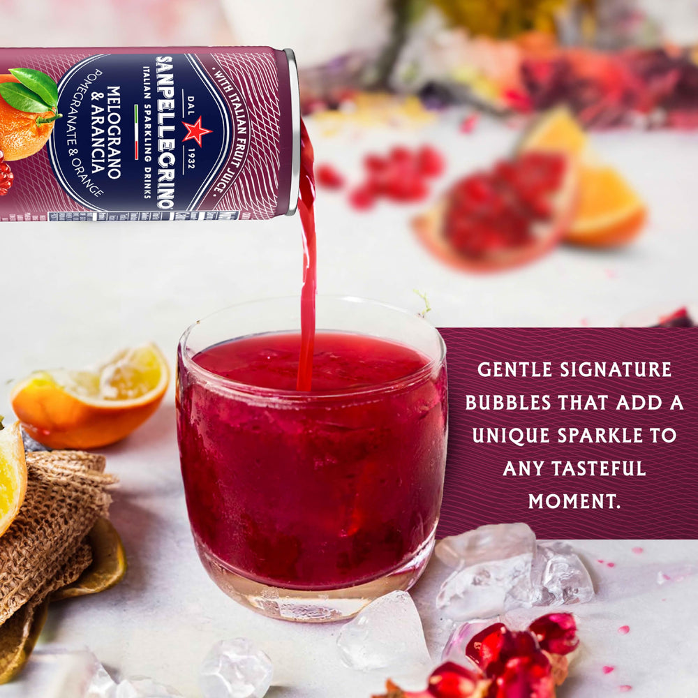 Sanpellegrino glass garnished with orange slice illustrating a refined serving suggestion for guests