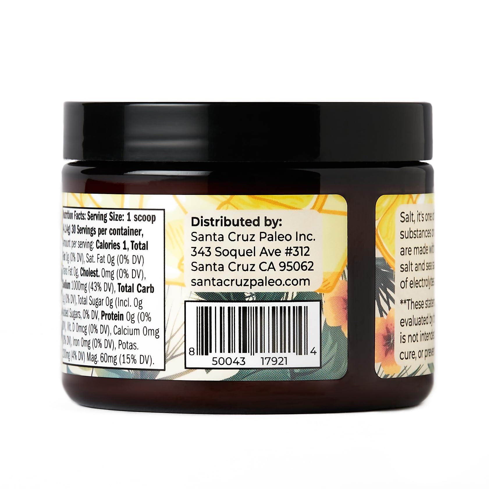 Hand holding Santa Cruz Paleo Lemonade tub to show size and portable convenience