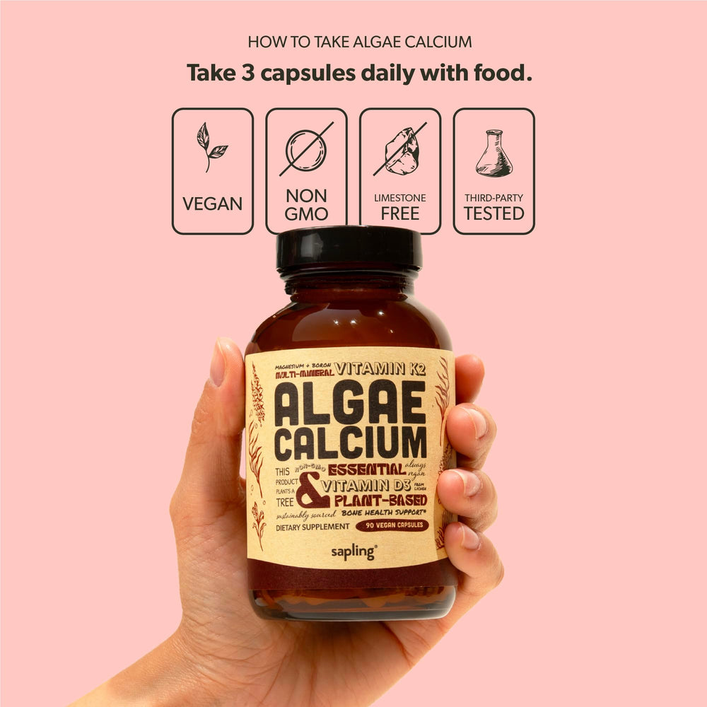 sapling serving size in hand demonstrating one-bottle convenience and scale