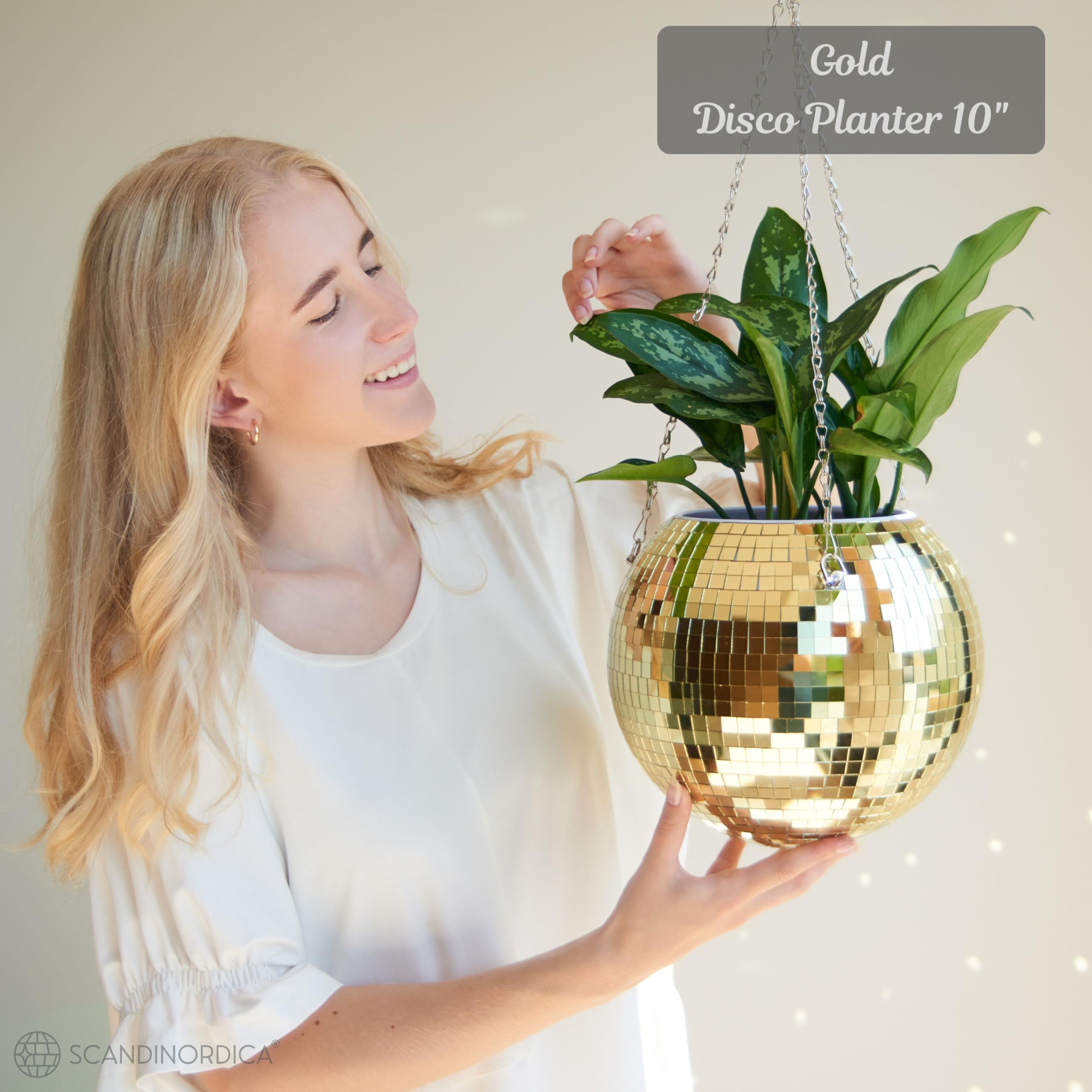 SCANDINORDICA close-up of gold mirror tiles highlighting handcrafted detail and sparkle
