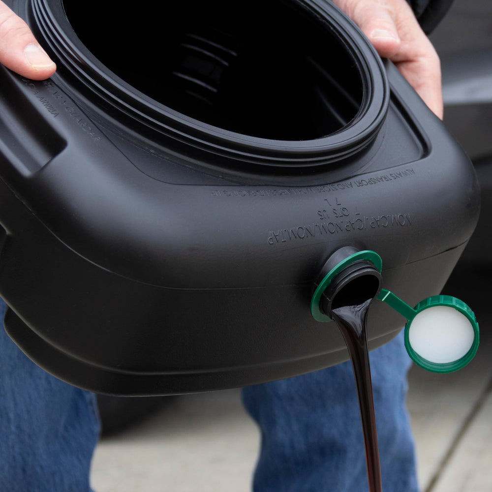 Scepter drain pan next to gallon jug showing compact size and easy recycling