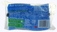 Scotch-Brite sponge next to sink caddy to show compact size and easy storage