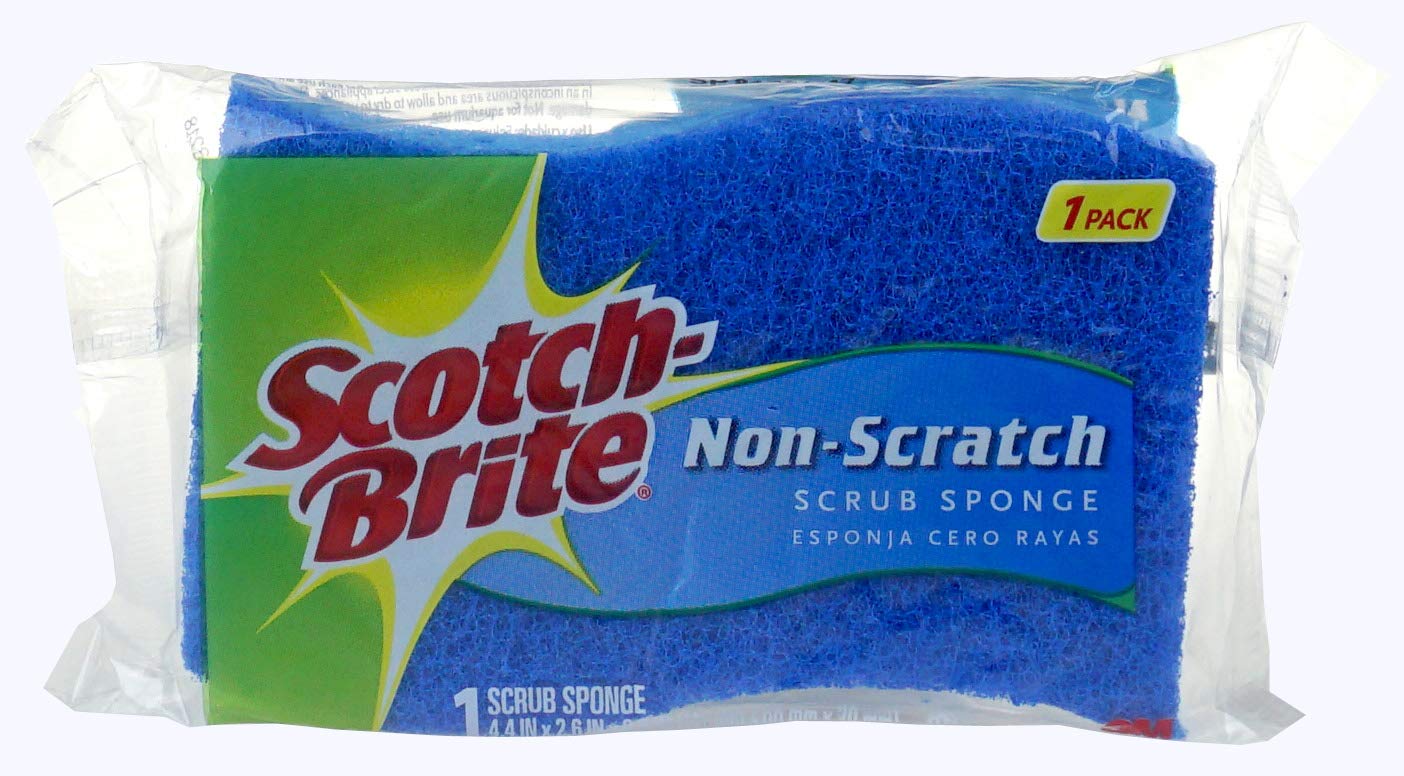 Scotch-Brite sponge in use washing a non-stick pan to protect the cookware finish