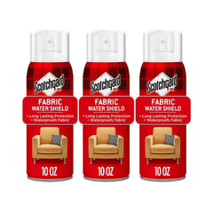 Scotchgard spray in action on sofa fabric preventing liquid absorption