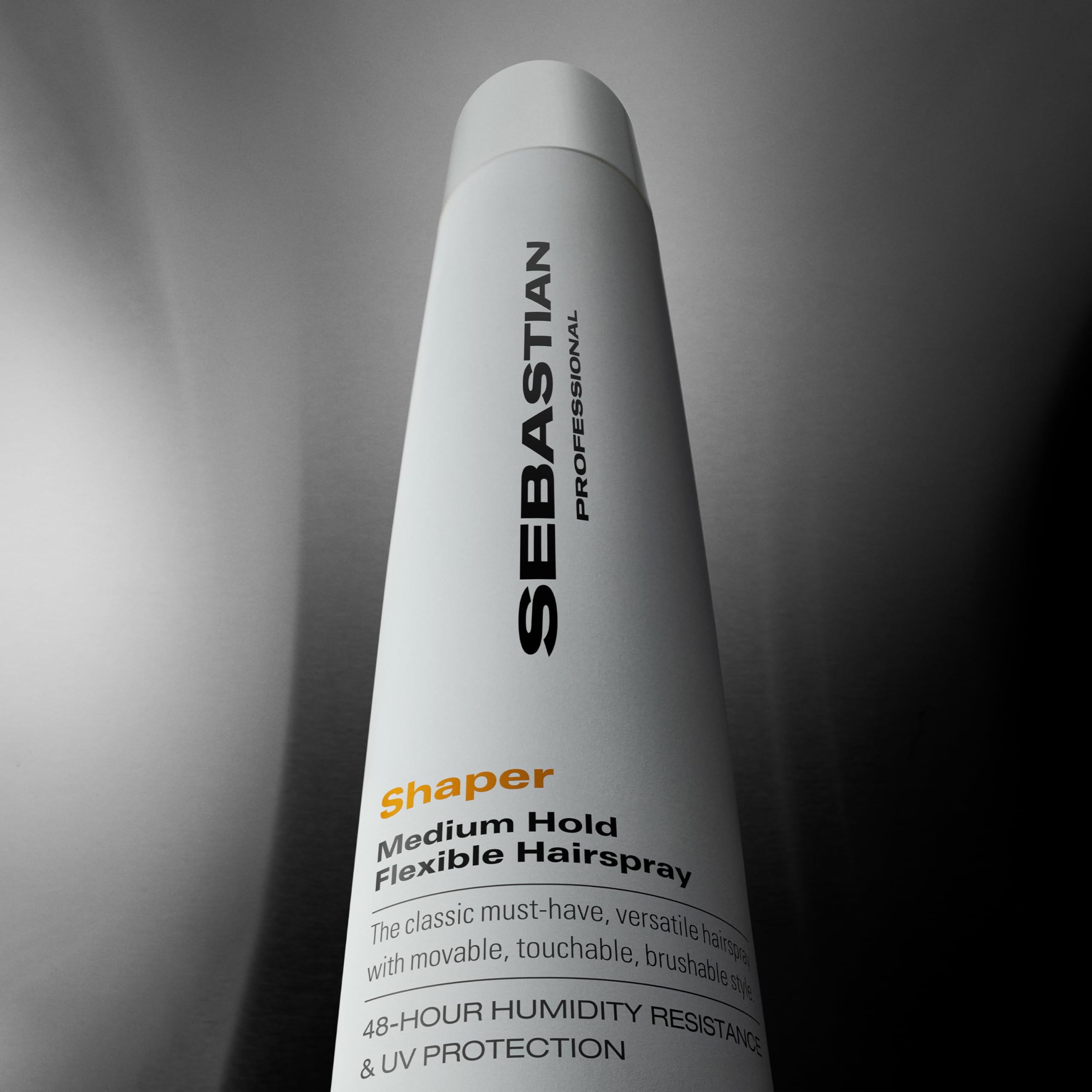 Sebastian Professional hair finish close-up showing non-sticky, flexible texture