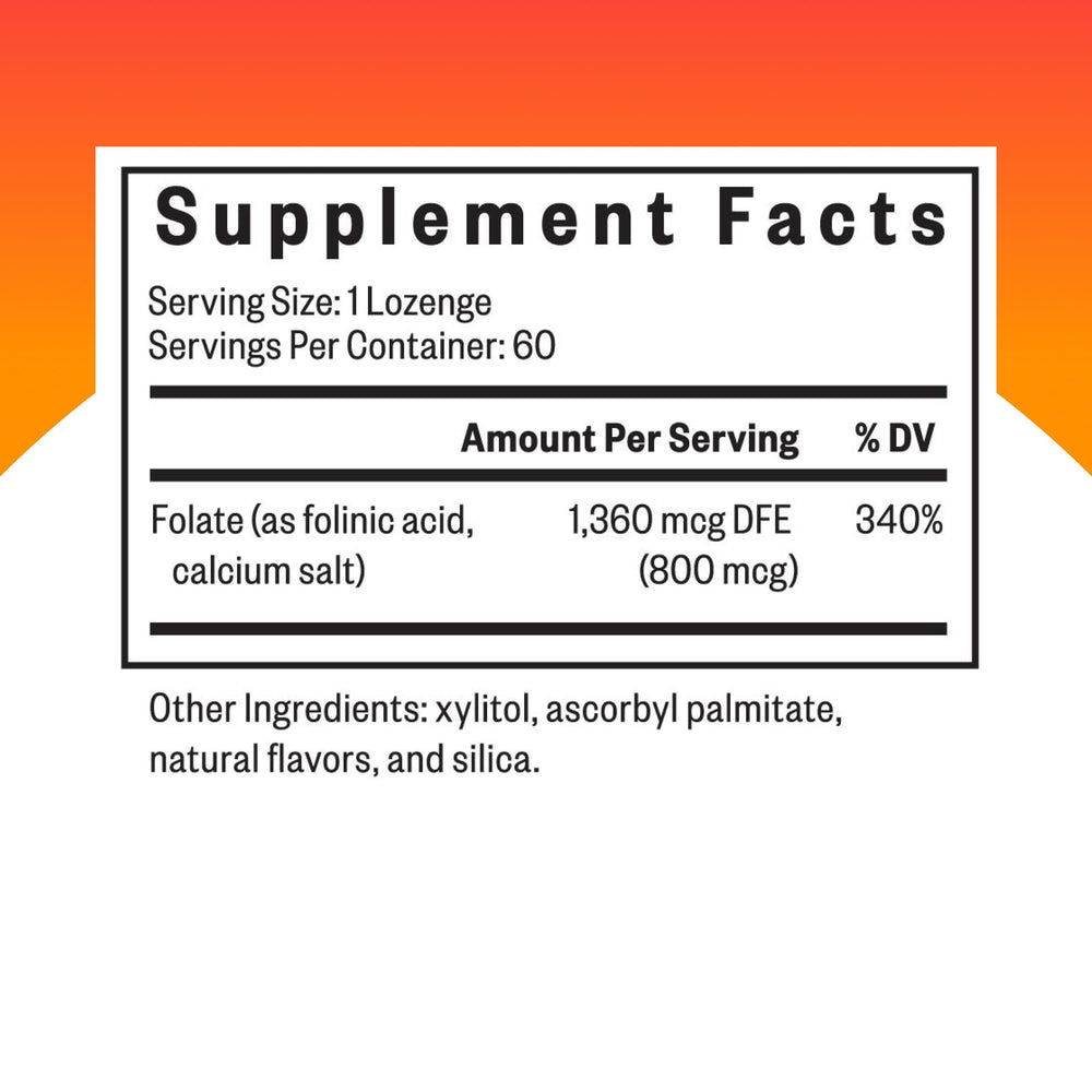 Close-up of a single Seeking Health folinic acid lozenge texture for easy intake