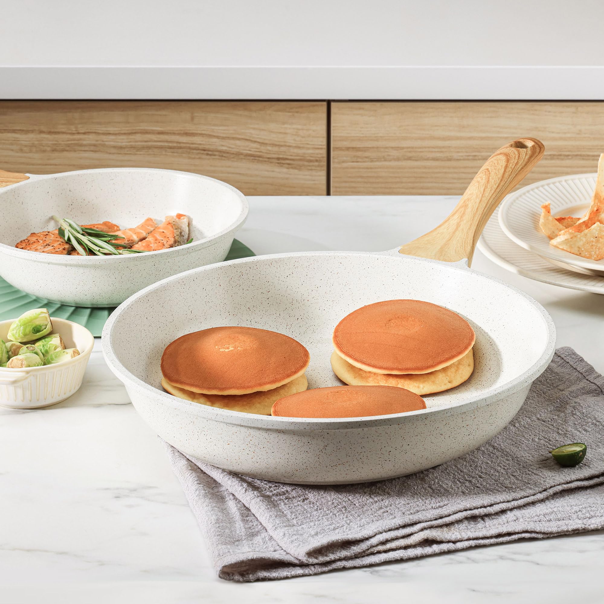 SENSARTE held in hand to show scale and portability for single-serve cooking convenience