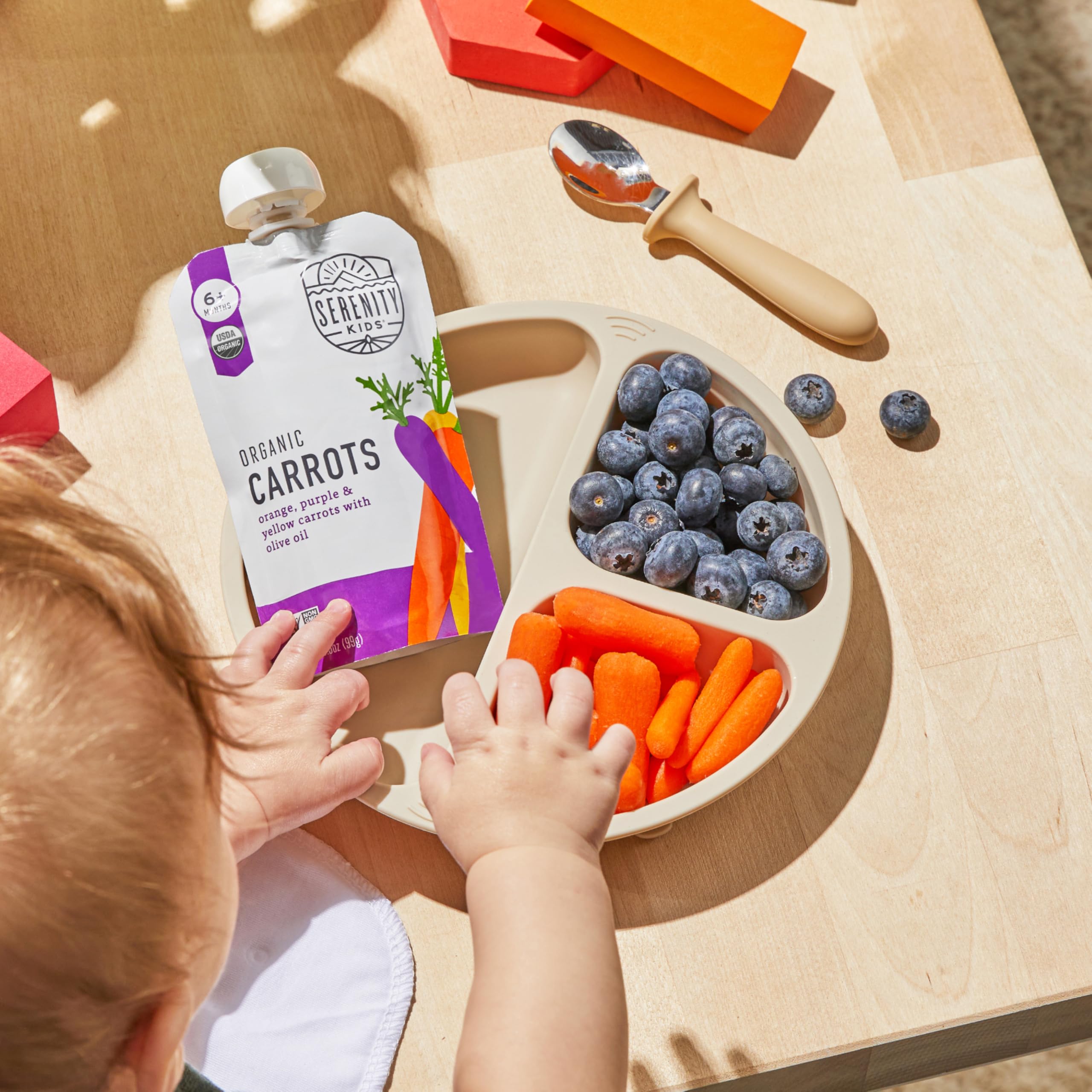 Serenity Kids pouches tucked in a diaper bag, travel-ready convenience benefit