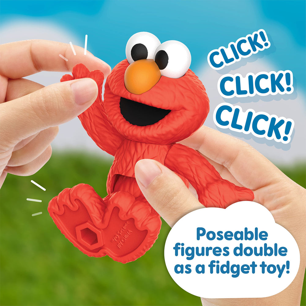Sesame Street Bert and Ernie duo in hands demonstrating cooperative play and fine motor benefits