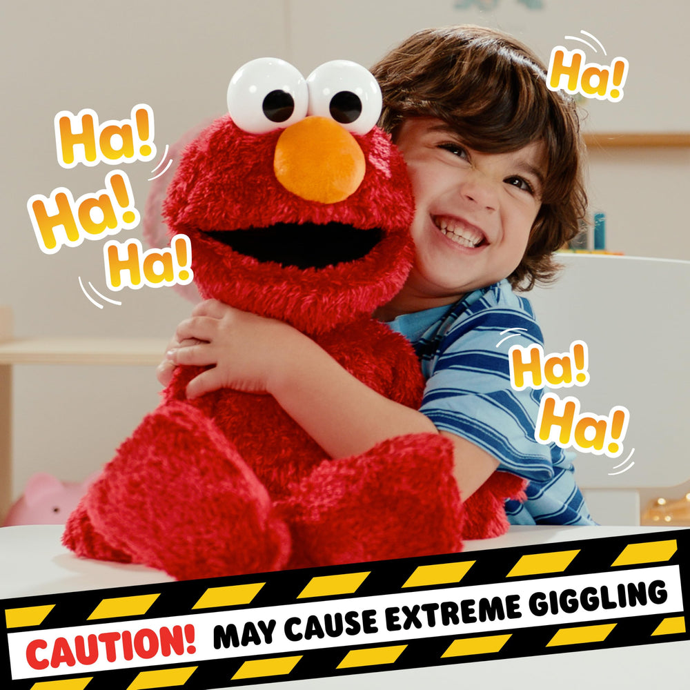 Sesame Street Elmo held by child illustrating safe size and joyful interaction benefit
