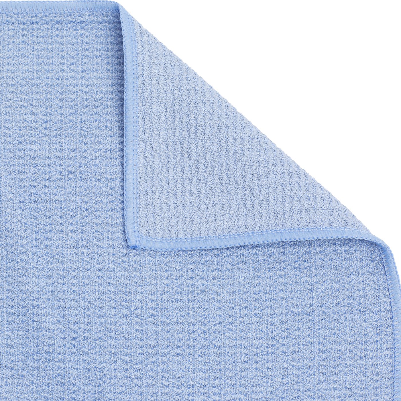 Shandali Stickyfiber placed on a yoga mat illustrating 24x72 size and secure practice surface