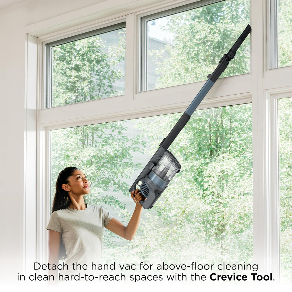 Shark IX141AMZ low-profile wand sliding under a sofa to reach hidden dust