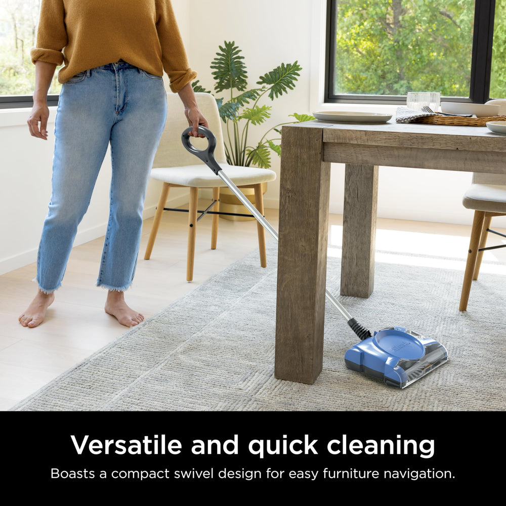 Shark V2700Z easy-empty dust cup removed for mess-free disposal benefit