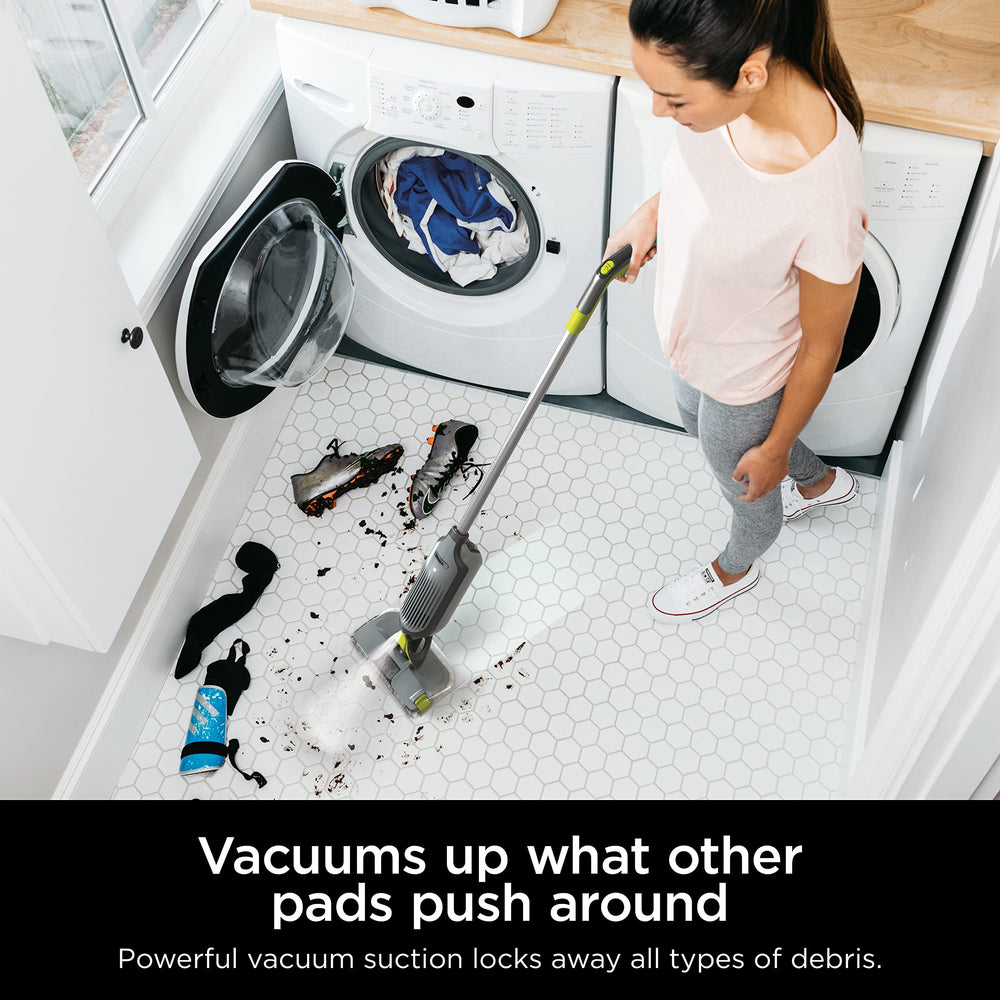 Shark VACMOP pad dirt chamber detail demonstrating debris containment