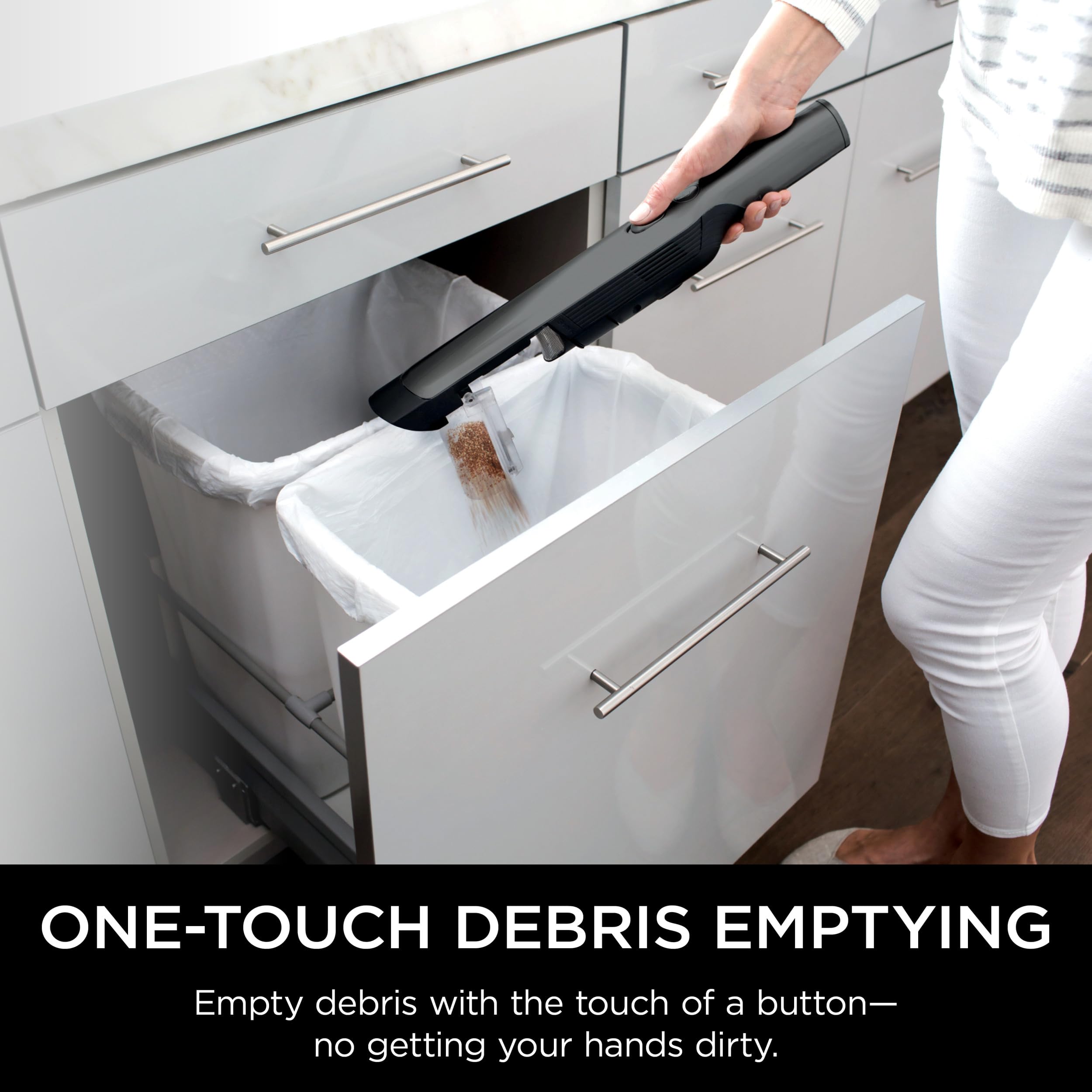 Shark WANDVAC held in hand illustrating 1.4 pound lightweight maneuverability