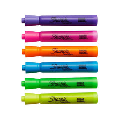 Sharpie in use highlighting textbook lines for quick emphasis and clarity