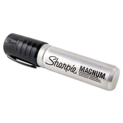 Sharpie Magnum marker writing bold black text on raw wood surface