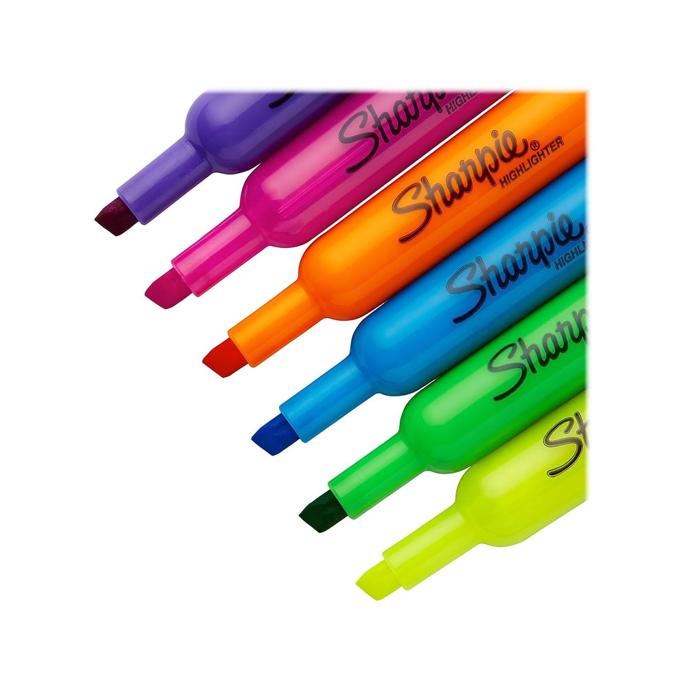 Sharpie beside notebook showing scale and comfortable wide-barrel grip benefit