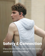 SHOKZ OpenMove worn by runner showing open-ear safety and stable wear