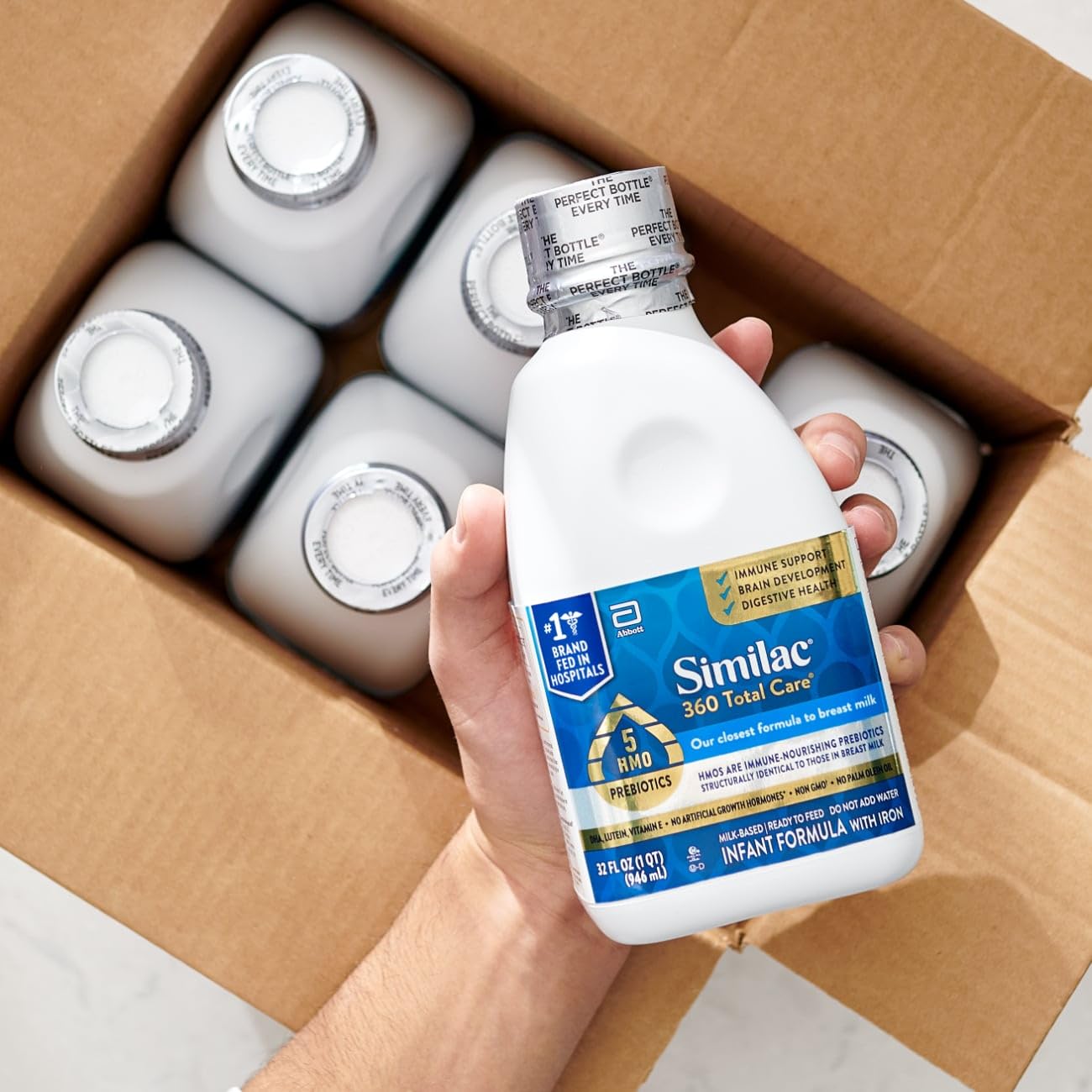 Similac 360 bottles stored in fridge for ready-to-serve freshness