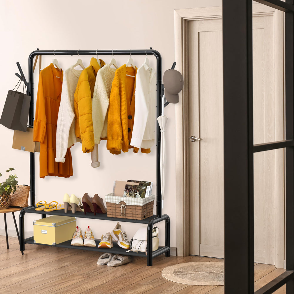 Simple Houseware in-use in bedroom with clothes and bins, creates organized visible wardrobe
