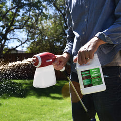 Simple Lawn Solutions bottle close-up highlighting concentrated formula benefit