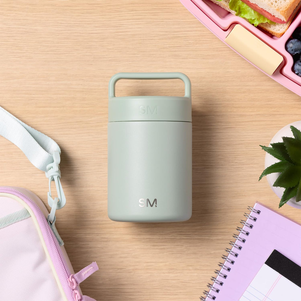 Simple Modern Provision next to a water bottle showing 12oz scale