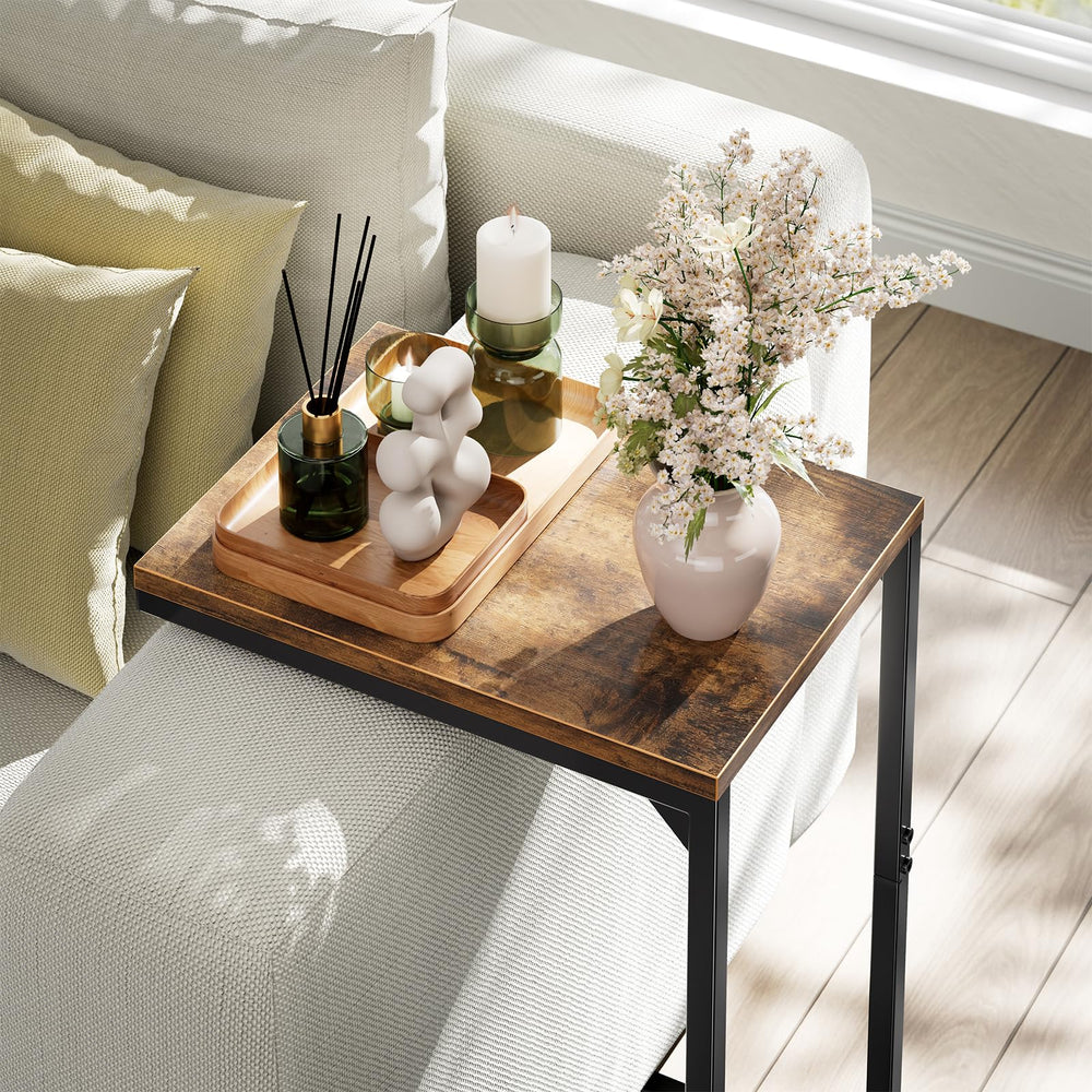 Simple Trending beside bed holding lamp and book demonstrating bedside use