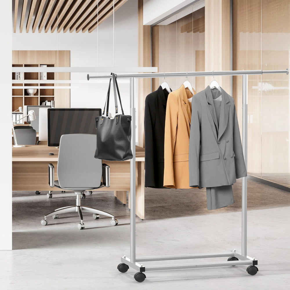 Simple Houseware rack loaded with clothes showing capacity and practical storage benefit