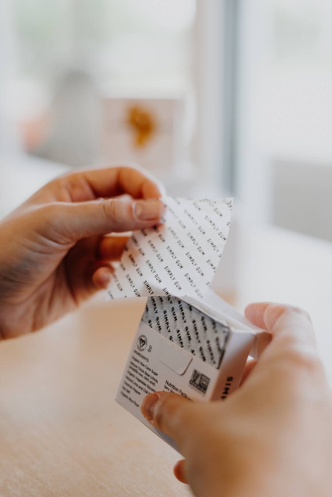 SIMPLY Gum lifestyle on-the-go pocket shot showing portable, plastic-free chewing gum