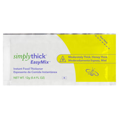 Simply Thick single packet opened next to a measuring cup for easy use